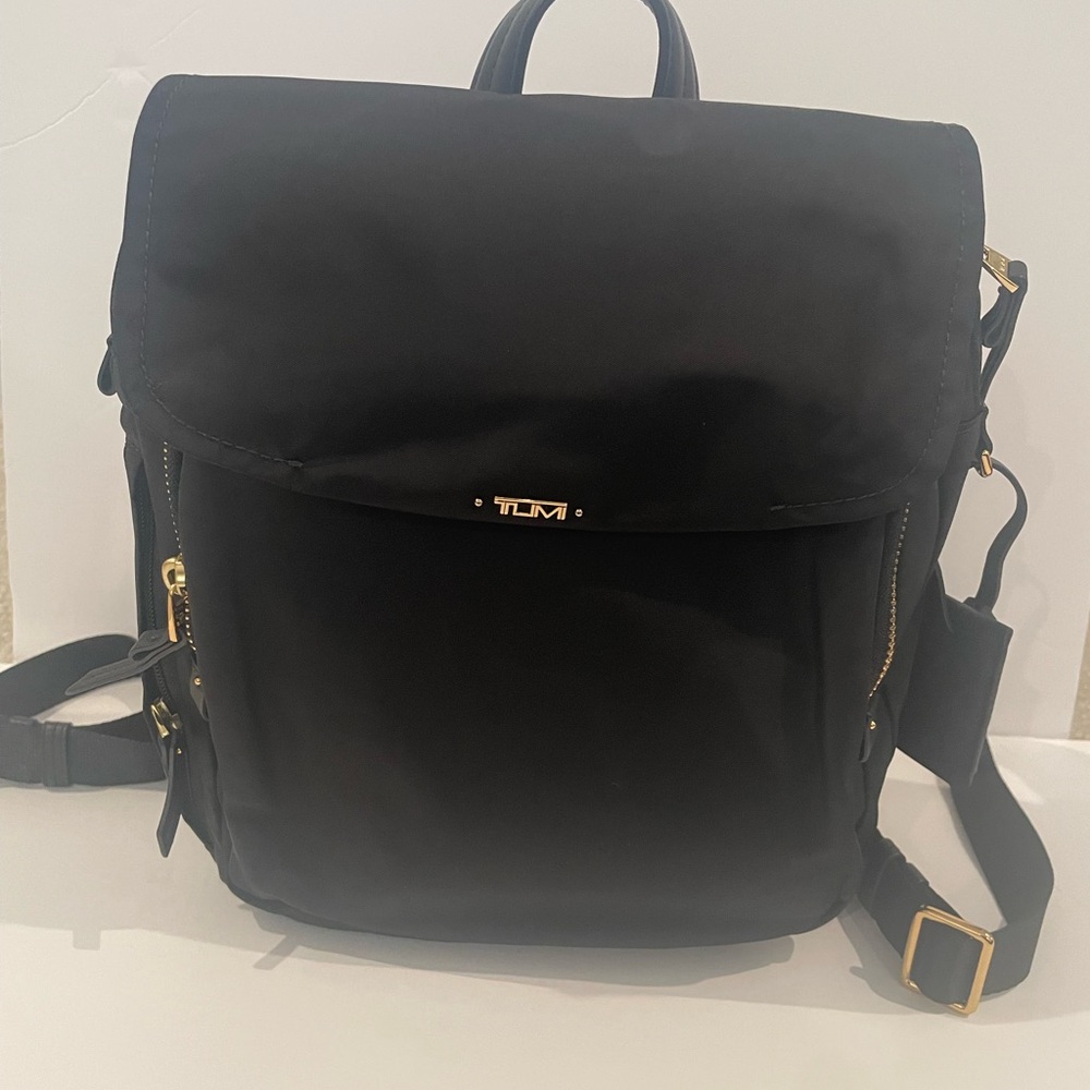 Mini Tumi Black Backpack with Gold Accents